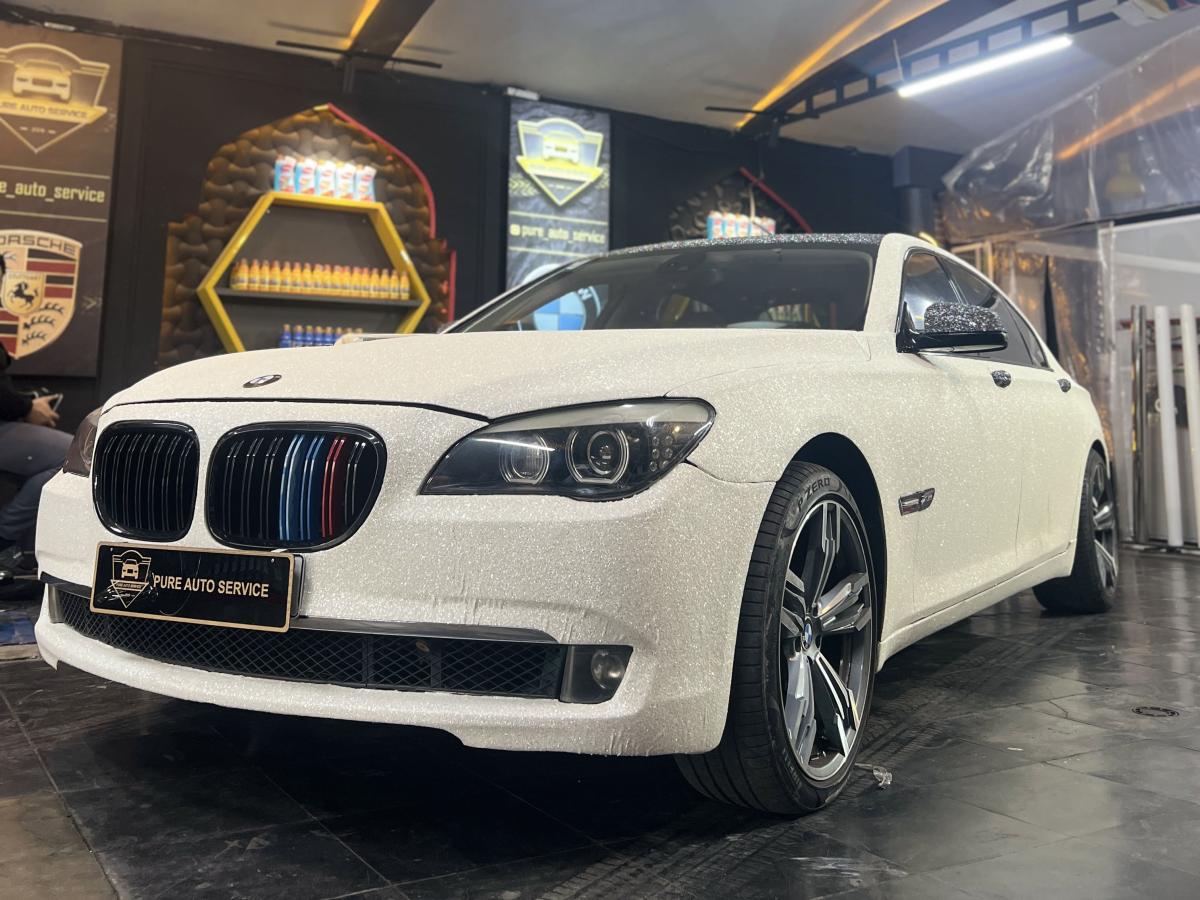 تعمیرات تخصصی بی ام و در پیور.jpg