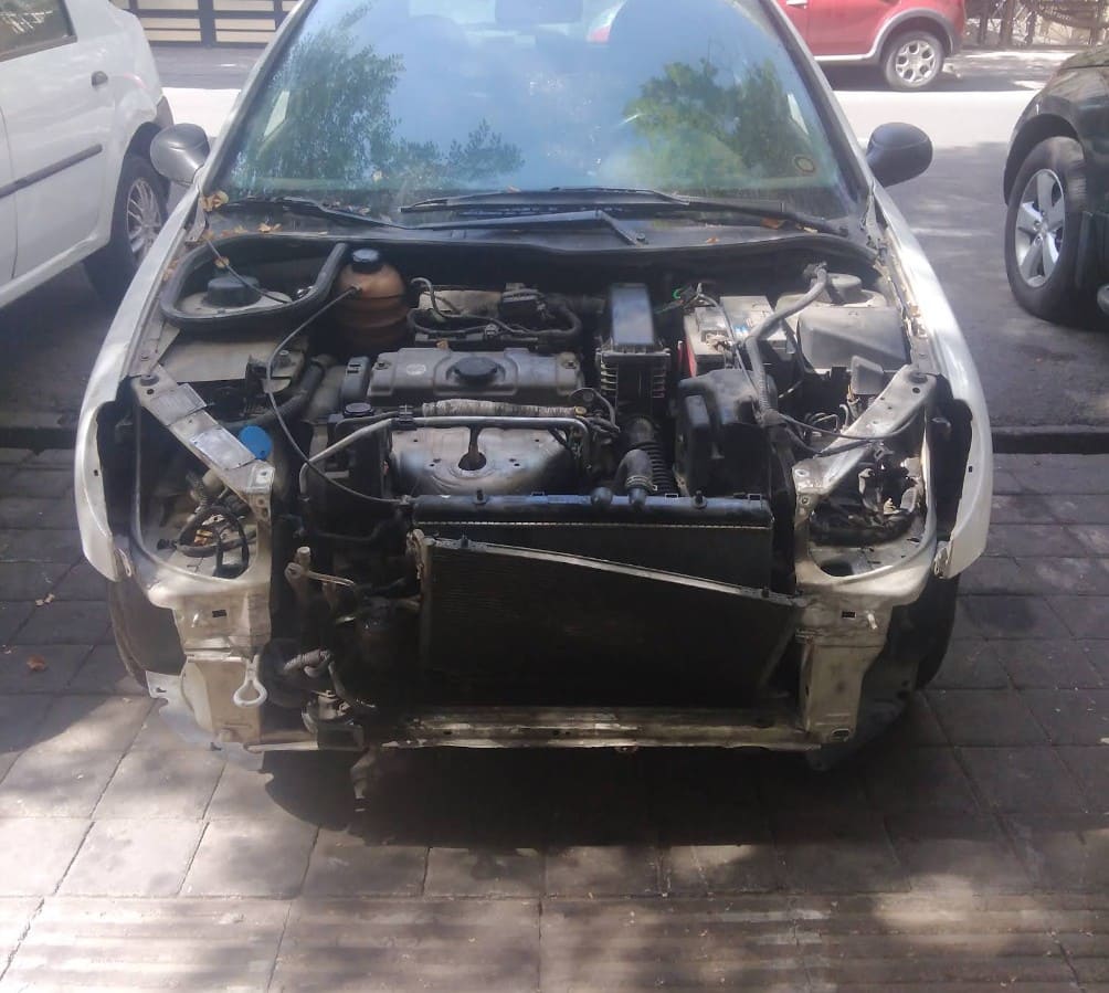 تعمیرگاه فرهنگ در منیریه - تعمیرات جلوبندی.jpg