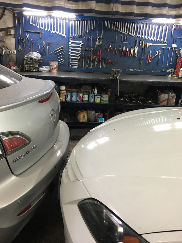 تعمیرگاه مزدا تاپ سرویس -3.jpeg