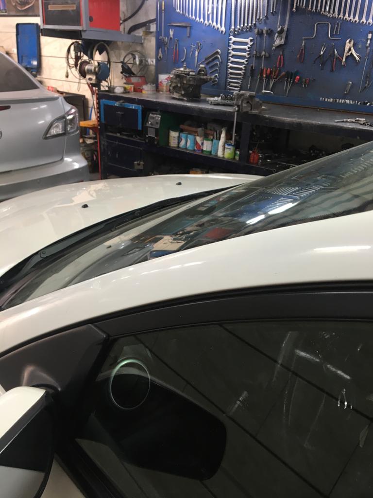 تعمیرگاه مزدا تاپ سرویس- 2.jpeg