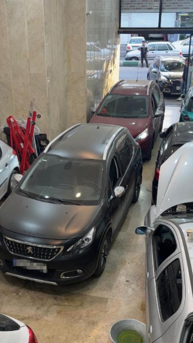 تعمیرگاه موسیو پژو - 2.jpg