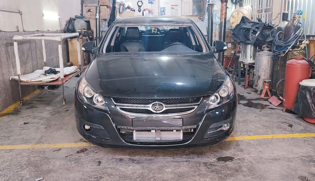 نمایندگی فروش و تعمیرگاه کرمان موتور در همدان - صافکاری و نقاشی (2).jpg