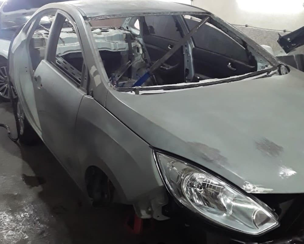 نمایندگی فروش و تعمیرگاه کرمان موتور در همدان - صافکاری و نقاشی.jpg