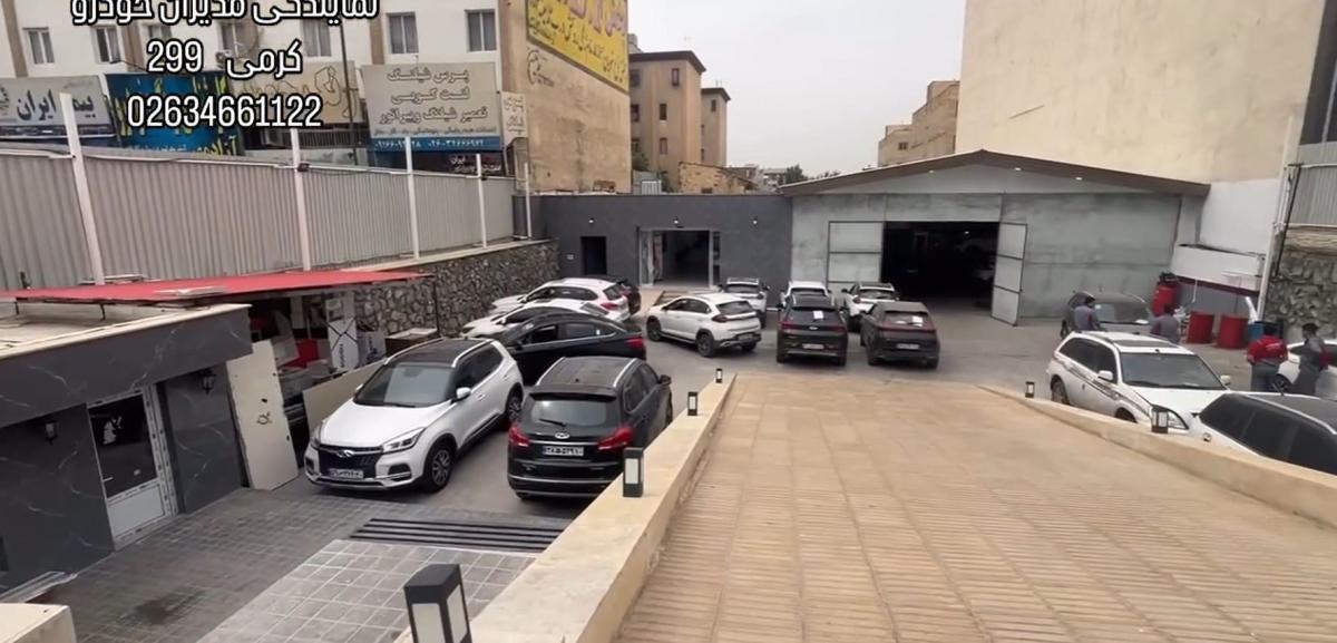 نمایندگی مدیران خودرو 299 کرمی در حصارک - نمای تعمیرگاه.jpg