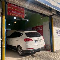 تعمیرگاه دکتر پژو در کرج - تعمیرات جک